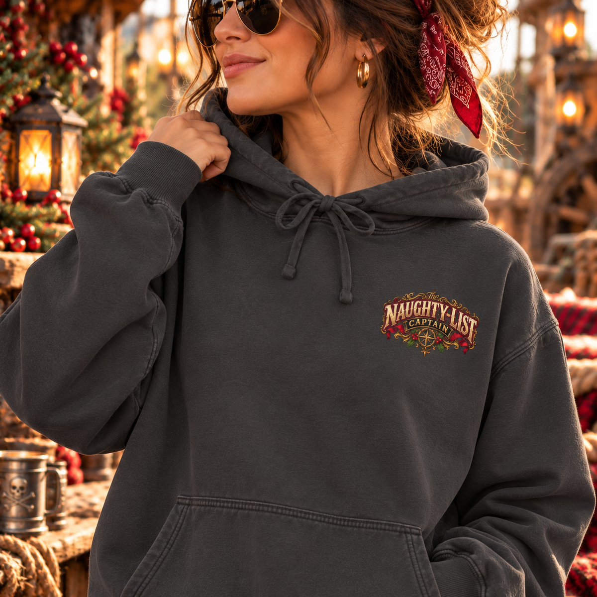 Santa Stop Judging Me pirate Christmas hoodie: Naughty-List Captain crest on the chest and a pirate captain signing the naughty list on the back, Comfort Colors garment-dyed hoodie - alternate view
