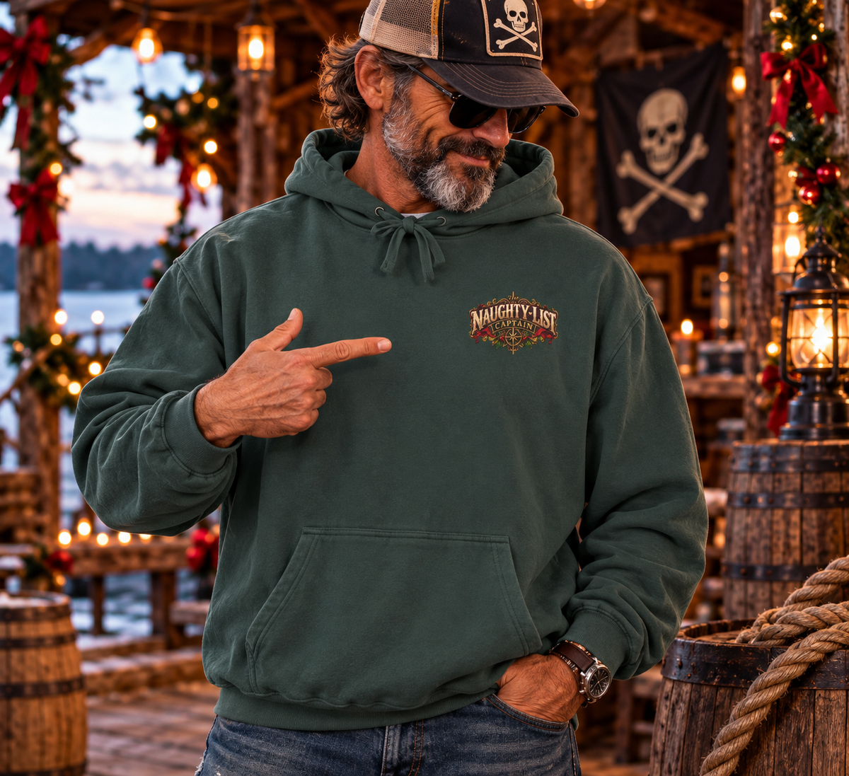 Santa Stop Judging Me pirate Christmas hoodie: Naughty-List Captain crest on the chest and a pirate captain signing the naughty list on the back, Comfort Colors garment-dyed hoodie - alternate view