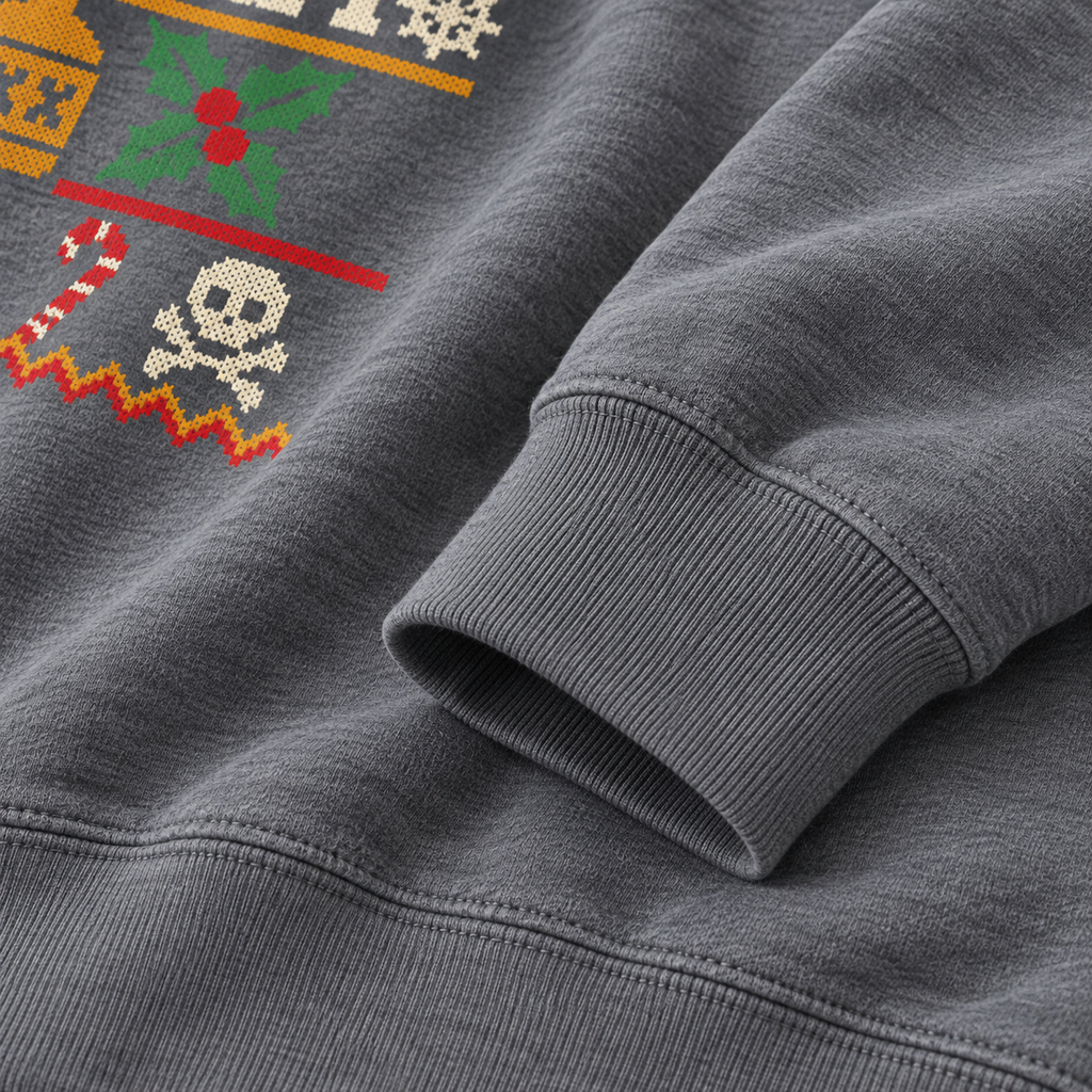 Detail of the ribbed cuff and the skull, candy cane and zigzag hem of the Bah Hum sweatshirt print
