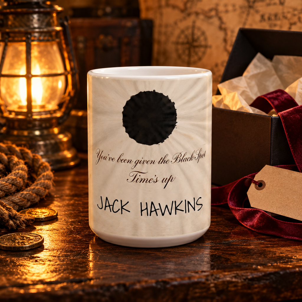 Black Spot mug personalized with Jack Hawkins beside an open gift box with a red ribbon