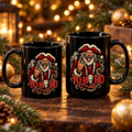 Two black Yo Ho Ho Pirate Santa mugs on a wooden table with Christmas lights, showing the rock and roll Santa on both sides