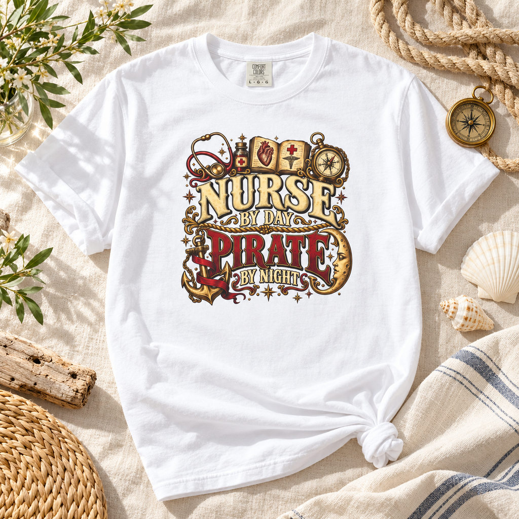 White Nurse by Day Pirate by Night tee laid flat with rope, seashells and greenery